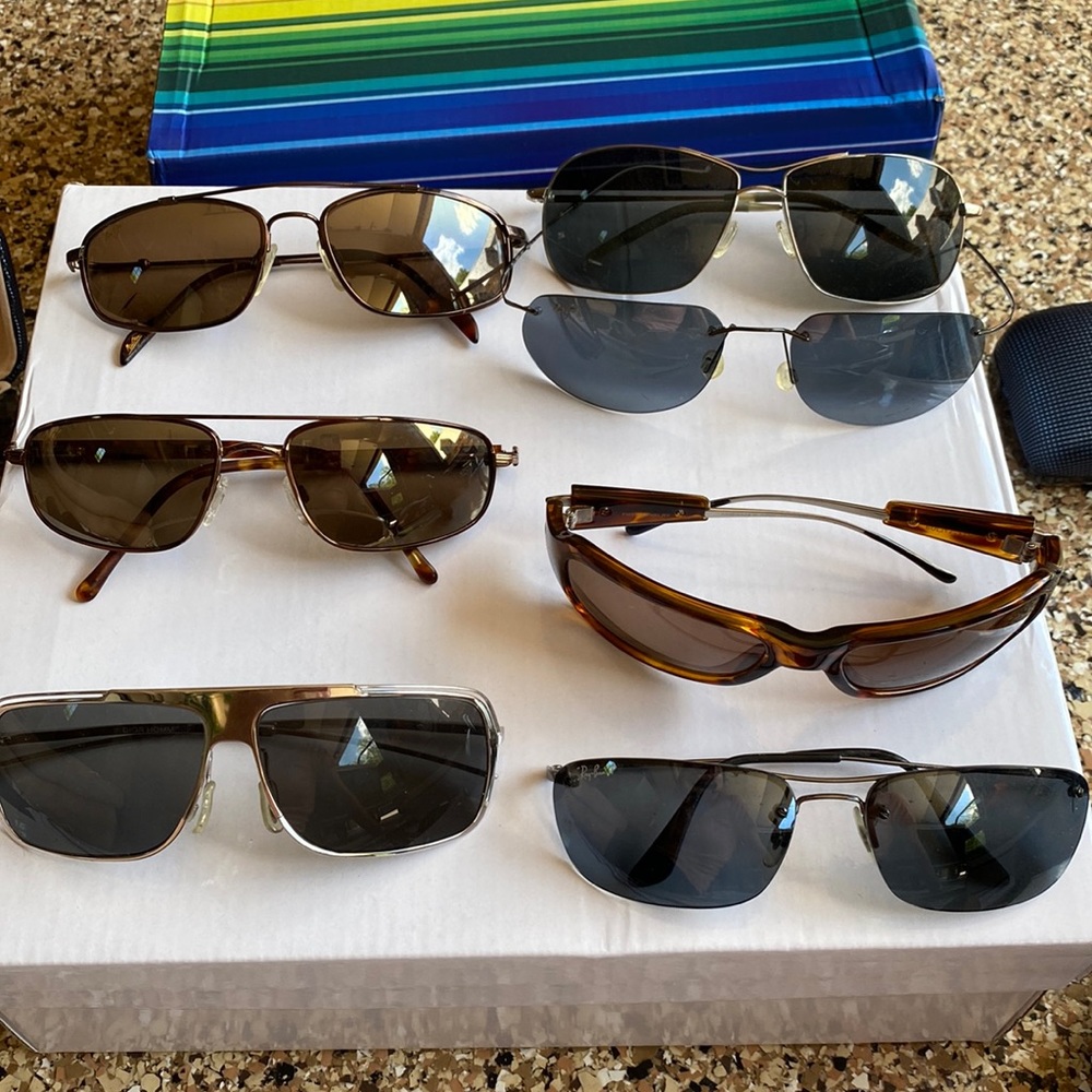 3 pair Maui Jim sunglasses, 1 Oliver Peoples,  1 Ray Ban, 1 Scheyden Sunglasses